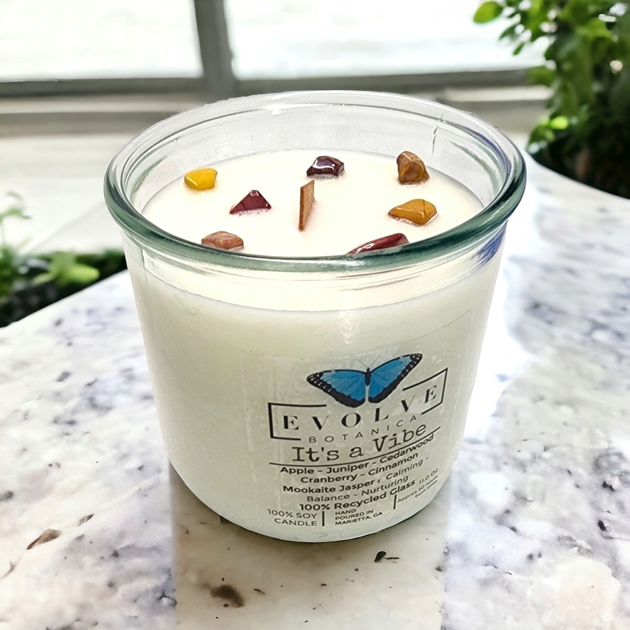 Evolve Botanica Rocks Candle It's a Vibe with Mookite Jasper gemstone, wood wick, soy wax, and natural earthy design.