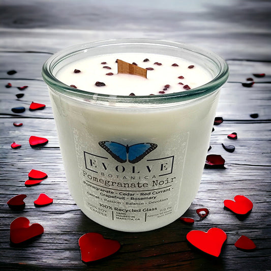 Evolve Botanica Rocks Candle Pomegranate Noir with wood wick, garnet gemstone, soy wax, and decorative design, cozy and elegant.