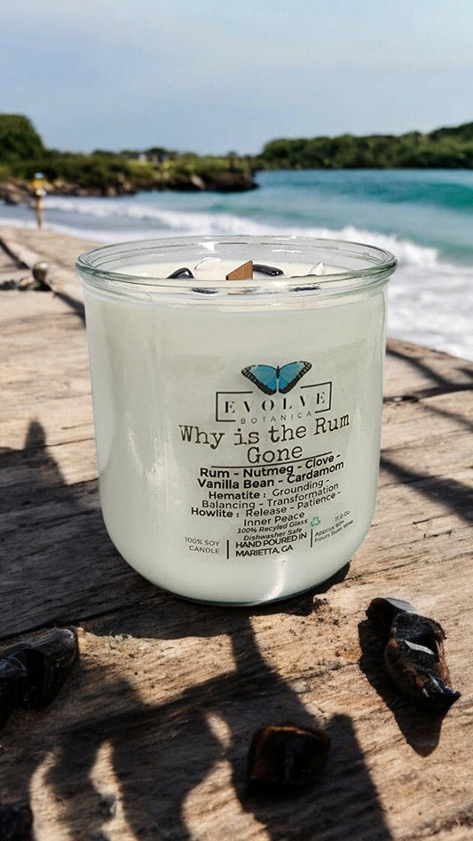 Rocks Candle by Evolve Botanica with wood wick, hematite, and howlite stones for grounding, balancing, and inner peace.