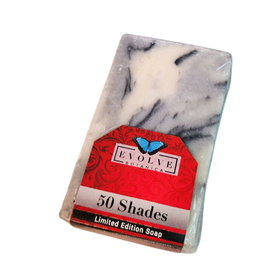 Evolve Botanica Seasonal Soap 50 Shades with botanical ingredients, showcasing a colorful, handcrafted soap bar on a natural background.