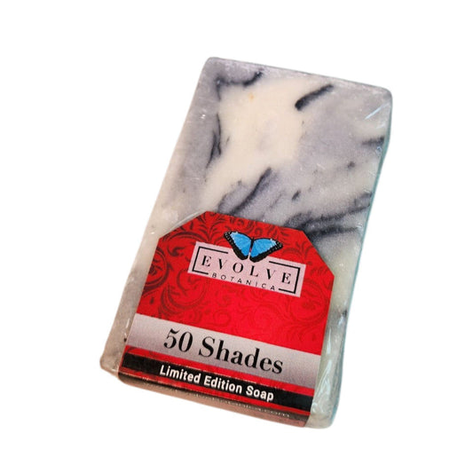 Evolve Botanica Seasonal Soap 50 Shades with botanical ingredients, showcasing a colorful, handcrafted soap bar on a natural background.