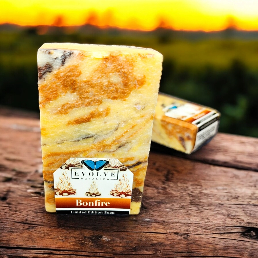 Evolve Botanica Seasonal Soap Bonfire with festive holiday wrapping, featuring warm, smoky scents for Christmas.