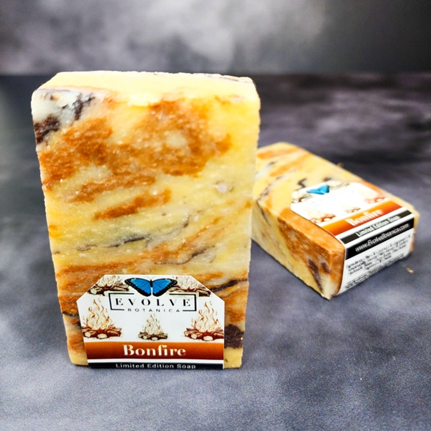 Evolve Botanica Seasonal Soap Bonfire with festive holiday packaging, featuring warm, smoky scent and winter-inspired design.