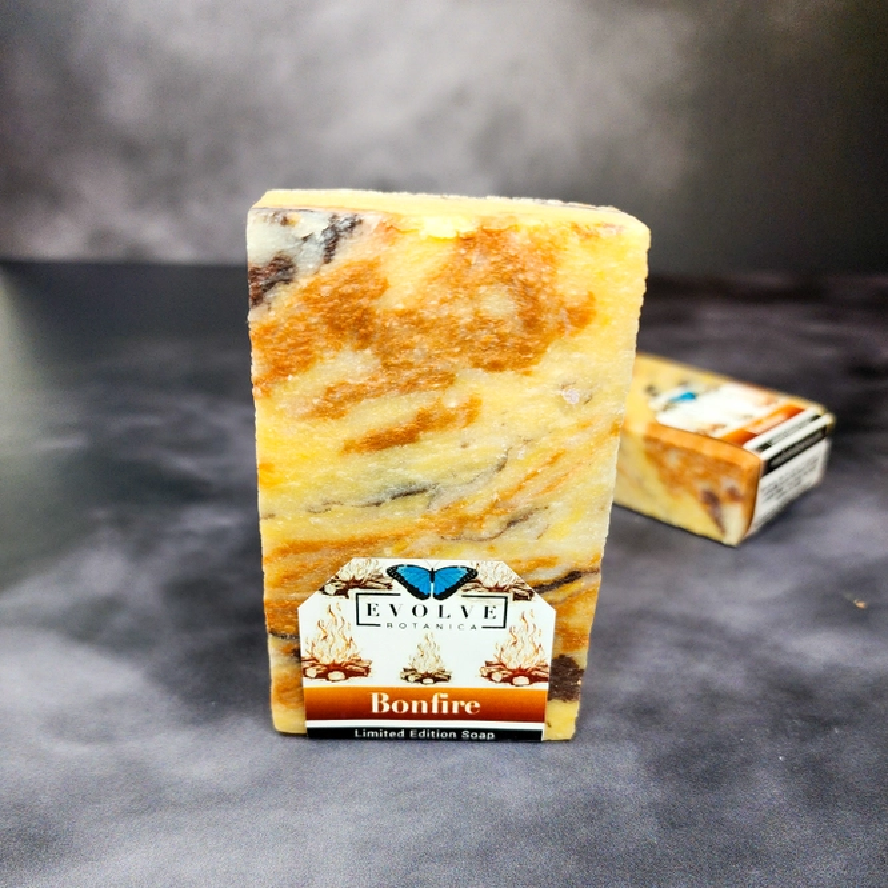 Evolve Botanica Seasonal Soap Bonfire with festive holiday design, featuring warm, smoky scent and Christmas-themed packaging.