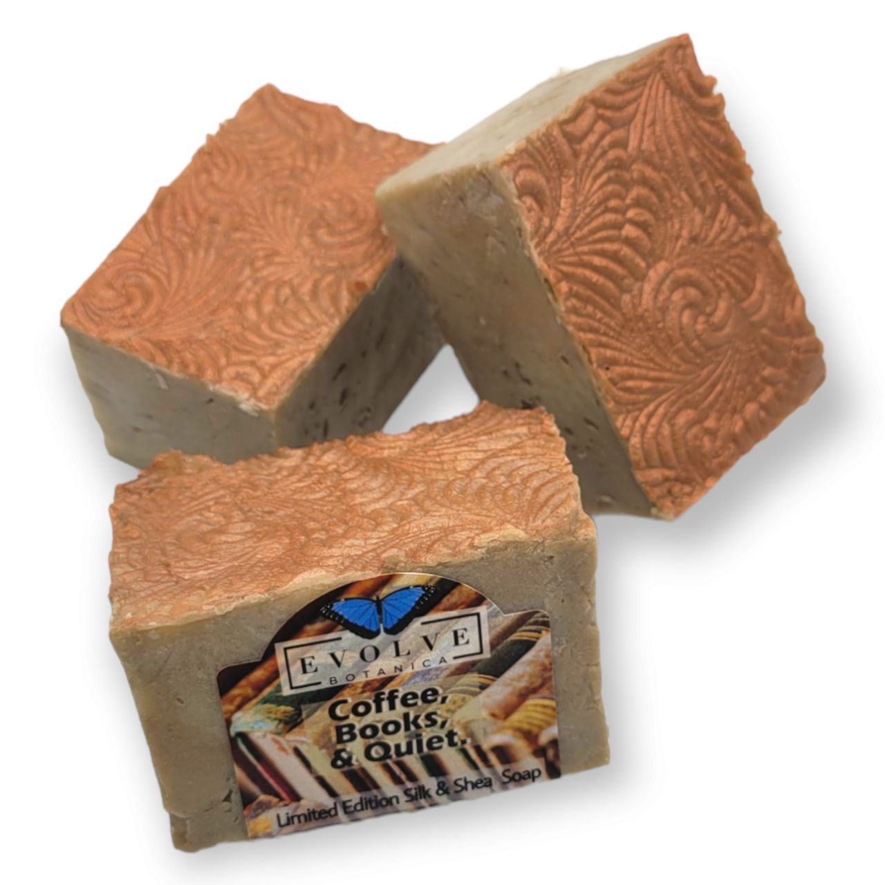 Limited edition Evolve Botanica specialty soap with coffee, books, and quiet design, showcasing a soothing, artisanal soap bar.