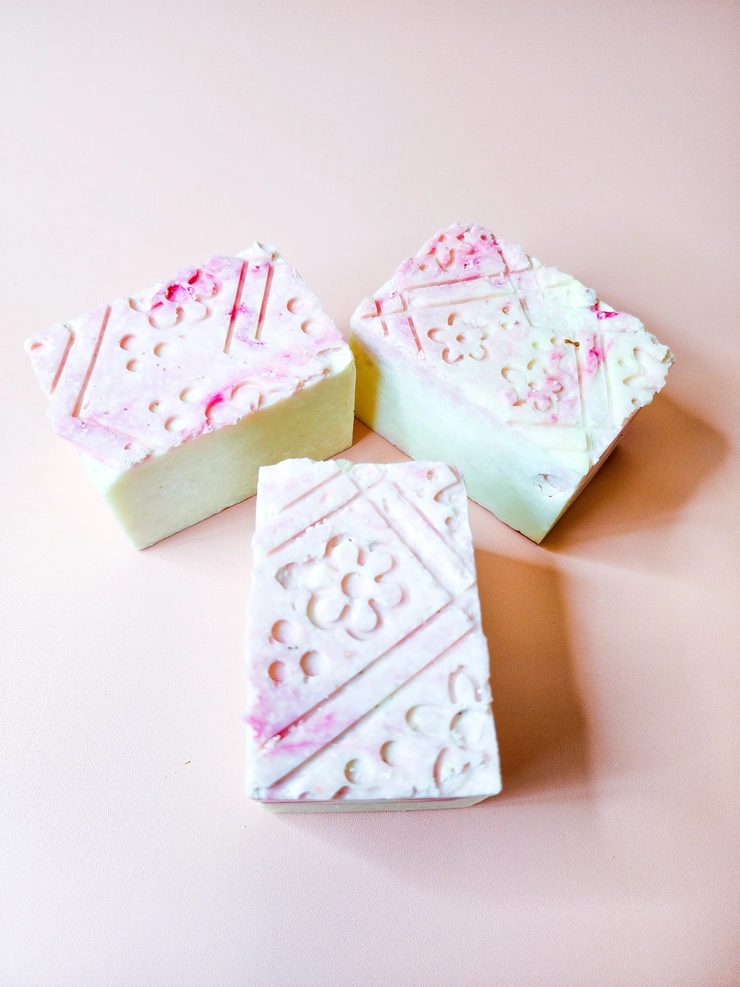 Evolve Botanica specialty soap bar with rosewater and sea salt, limited edition salt bar featuring floral and mineral ingredients.