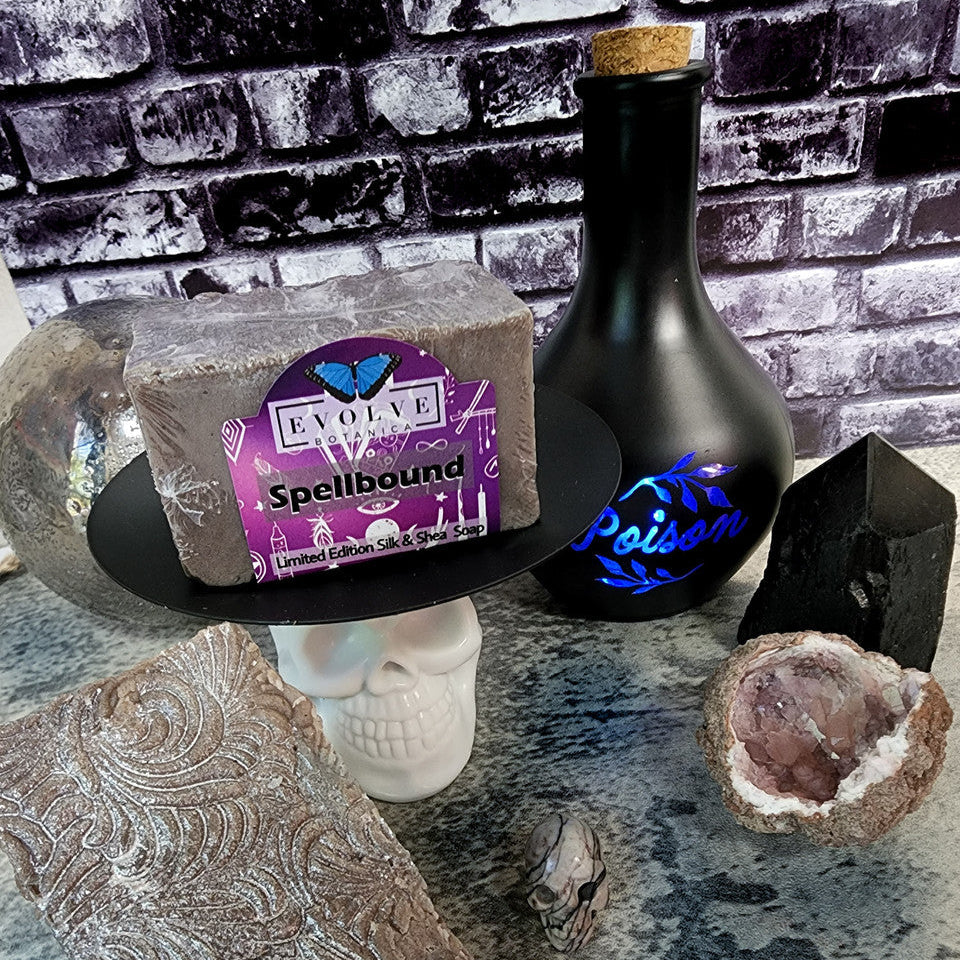 Evolve Botanica Spellbound seasonal Halloween specialty soap with festive packaging and vibrant, spooky design.