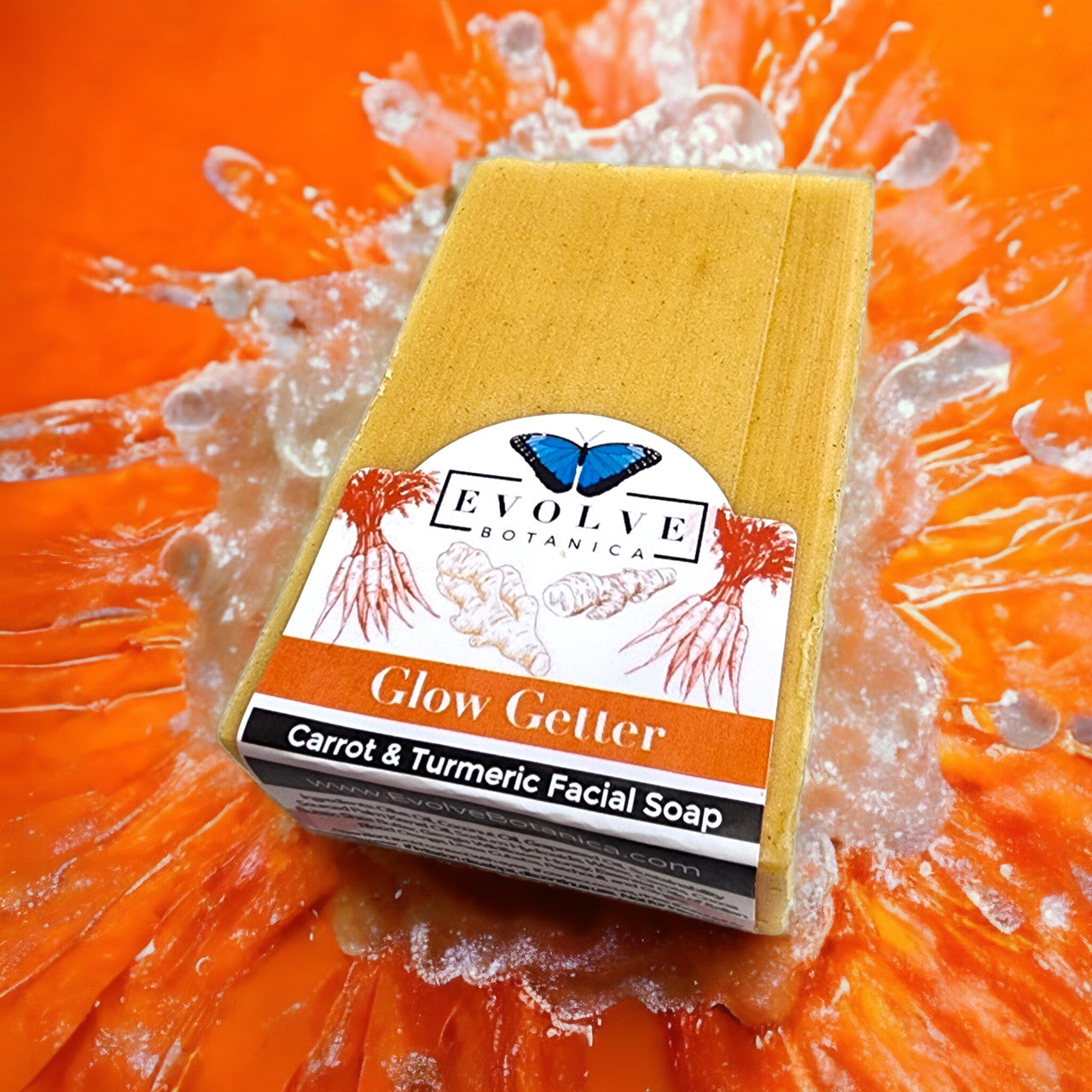 Evolve Botanica Glow Getter facial soap with carrot, turmeric, and honey, featuring a natural, creamy bar for glowing skin.