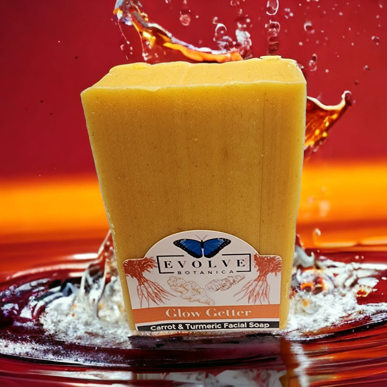 Evolve Botanica Glow Getter facial soap with carrot, turmeric, and honey, featuring a natural bar with vibrant orange and yellow hues.