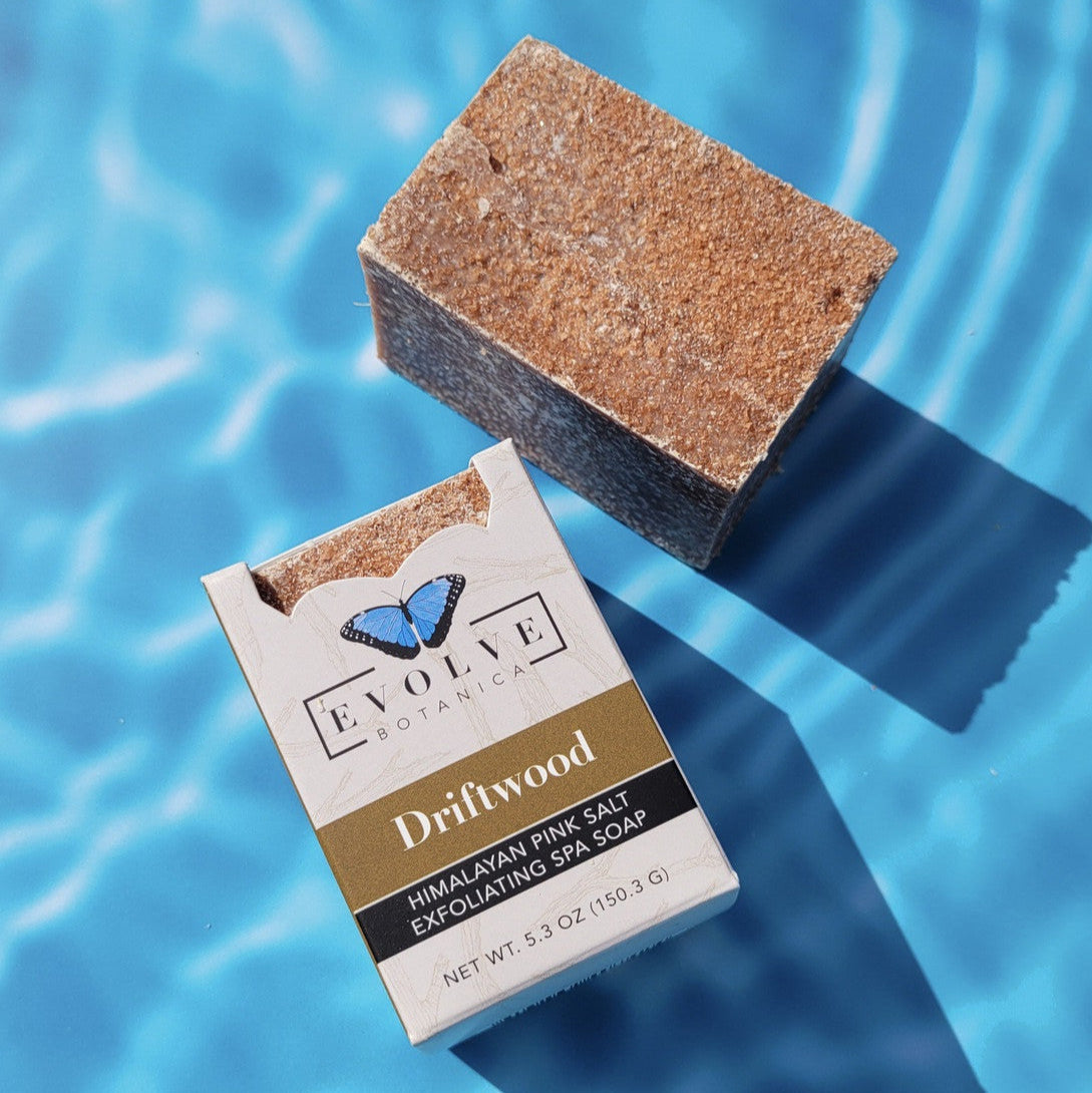 Evolve Botanica Driftwood Salt Bar specialty soap wrapped in unprinted glassine bag, showcasing natural, handcrafted soap appearance.