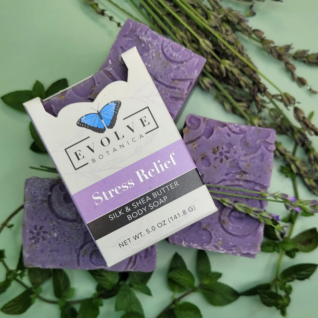 Evolve Botanica Stress Relief Silk specialty soap wrapped in unprinted glassine bag, showcasing its smooth, natural texture.