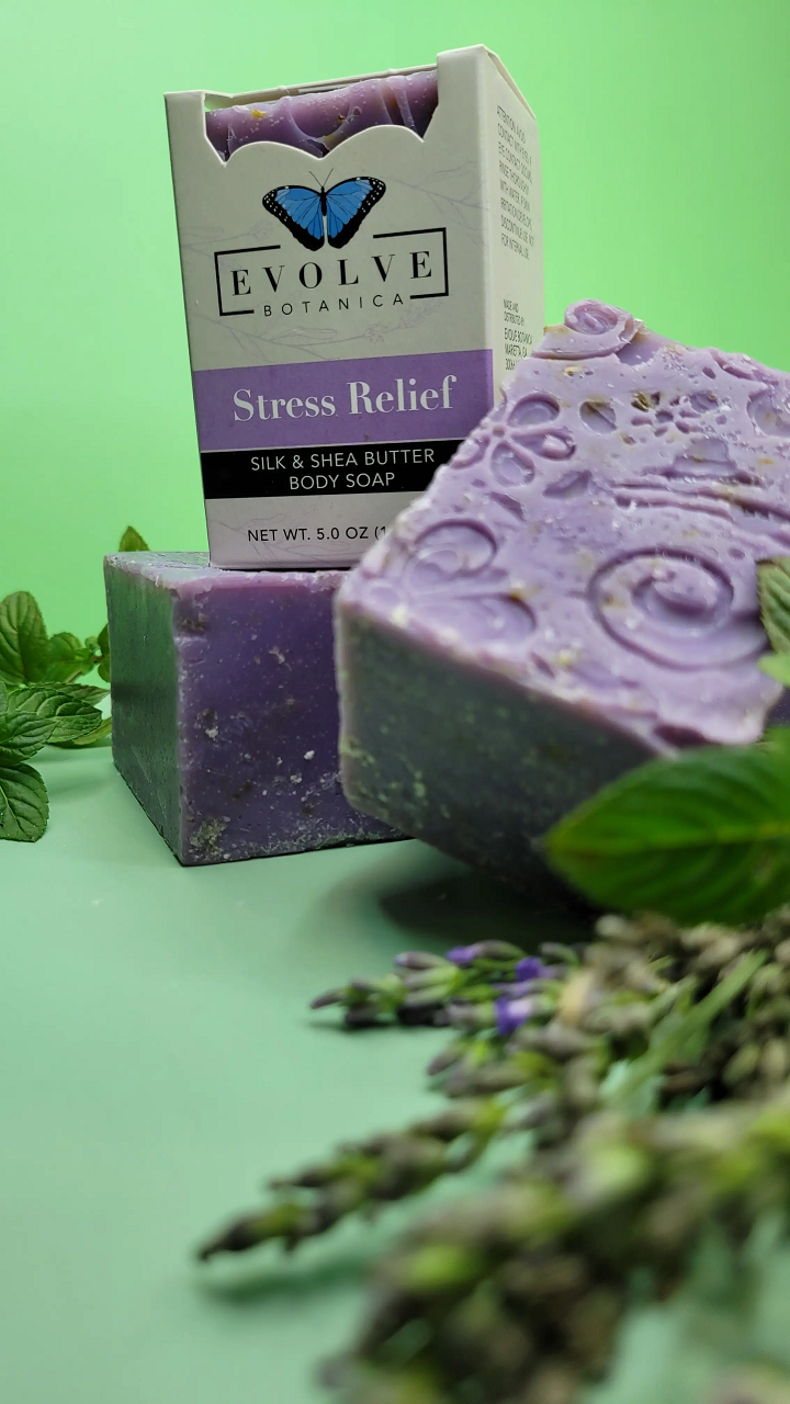 Evolve Botanica Stress Relief Silk specialty soap wrapped in unprinted glassine bag, showcasing smooth, natural soap with calming ingredients.