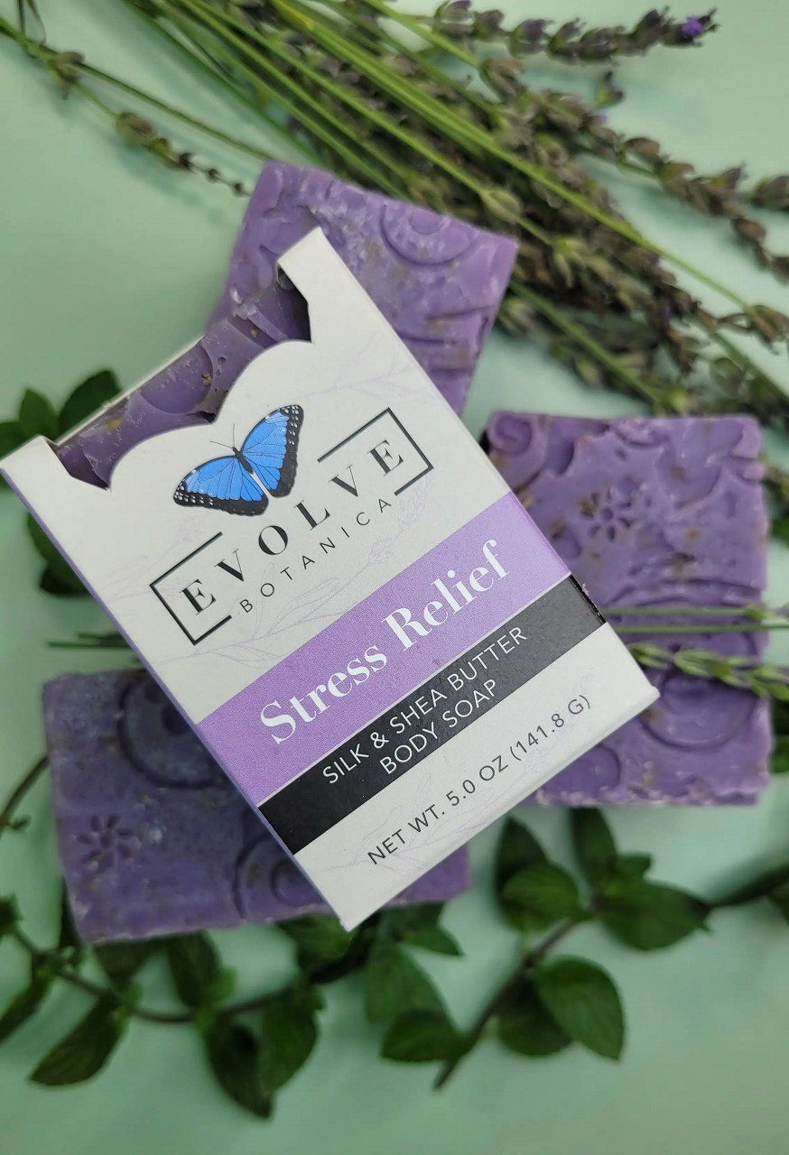 Evolve Botanica Stress Relief Silk specialty soap wrapped in unprinted glassine paper, natural and soothing for relaxation.