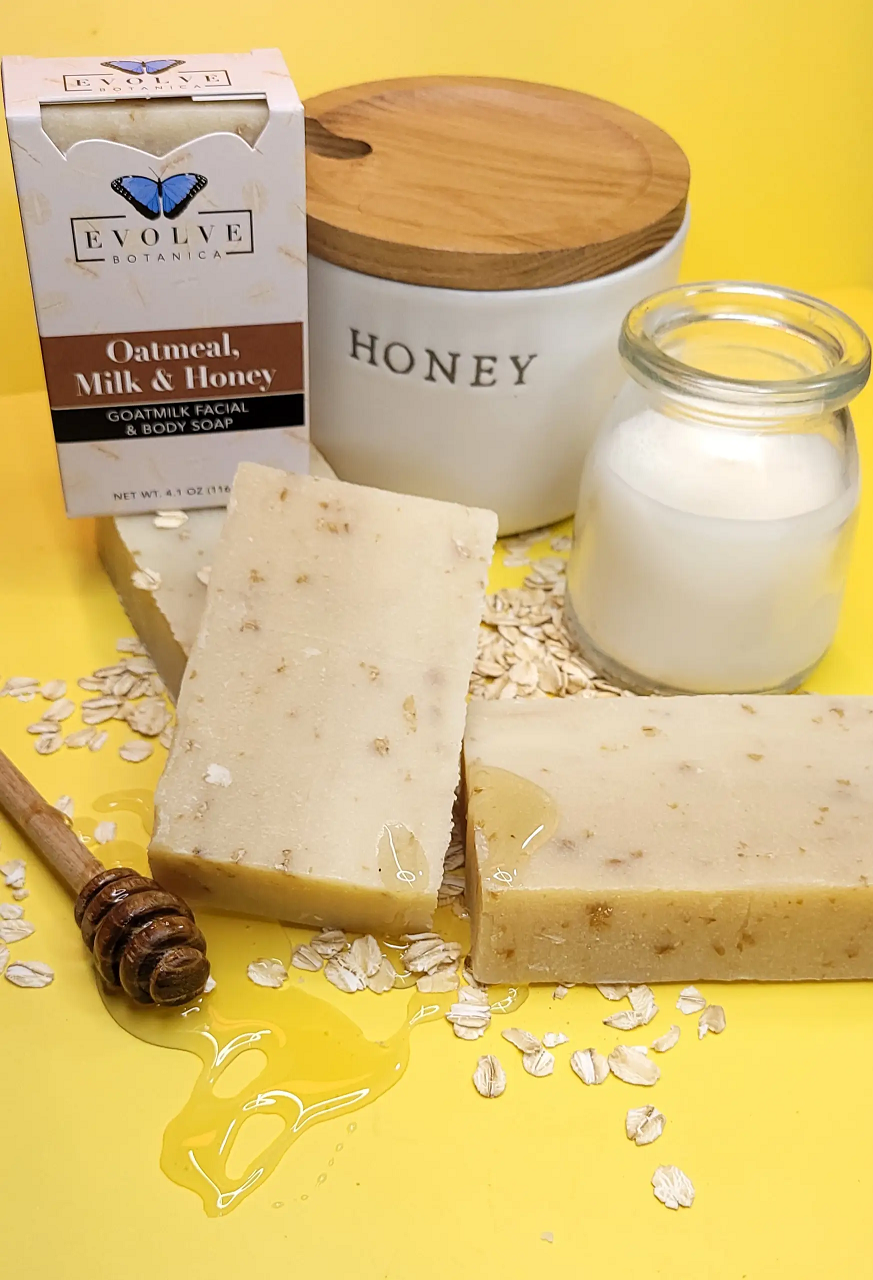 Evolve Botanica oatmeal, milk, and honey goatmilk facial and body soap in a plain, unprinted glassine bag for shipping.