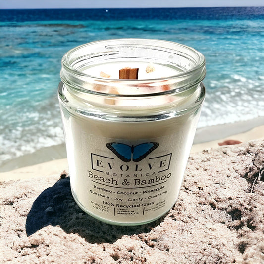 Evolve Botanica 9oz jam jar crystal soy candle with natural wood wick, Beach & Bamboo scent, Sunstone color, in a classic jar.