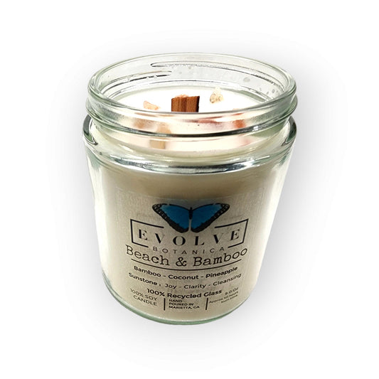 Evolve Botanica 9oz jam jar crystal soy candle with natural wood wick, beach and bamboo scent, Sunstone color.