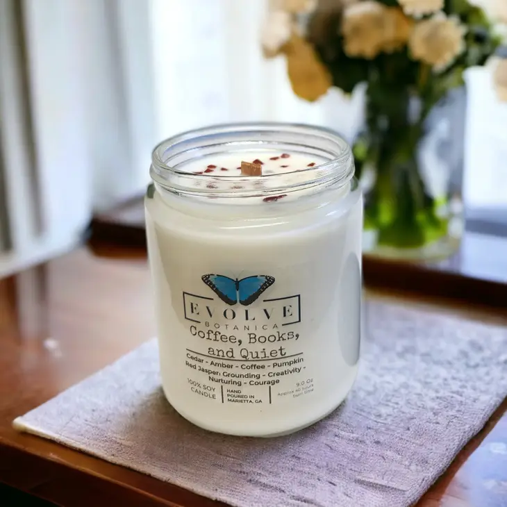 Evolve Botanica Classic 9oz Jam Jar Crystal Soy Candle in Jasper with natural wood wick, featuring coffee and book-themed design