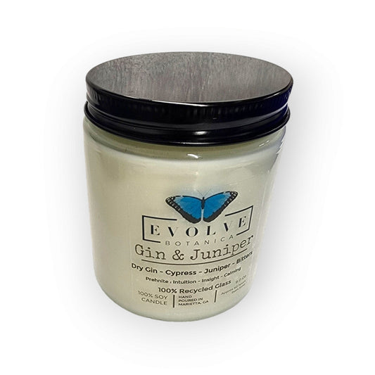 Evolve Botanica Classic 9oz Jam Jar Crystal Soy Candle with Gin & Juniper scent and Prehnite crystal, natural wood wick.