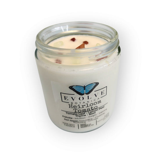 Classic 9oz jam jar soy candle by Evolve Botanica with heirloom tomato scent, featuring Prehnite and Red Jasper crystals.