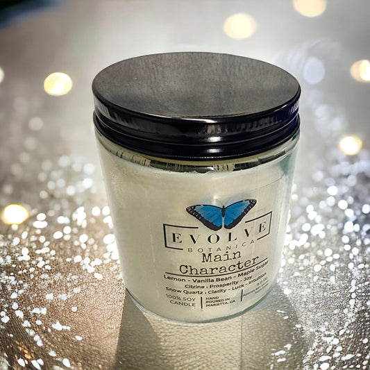 Evolve Botanica Classic 9oz Jam Jar Crystal Soy Candle with Citrine and Snow Quartz, natural wood wick, and decorative crystals.