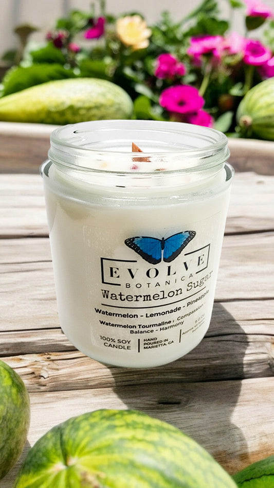 Evolve Botanica Classic 9oz jam jar crystal soy candle with natural wood wick and Watermelon Sugar scent featuring Watermelon Tourmaline.