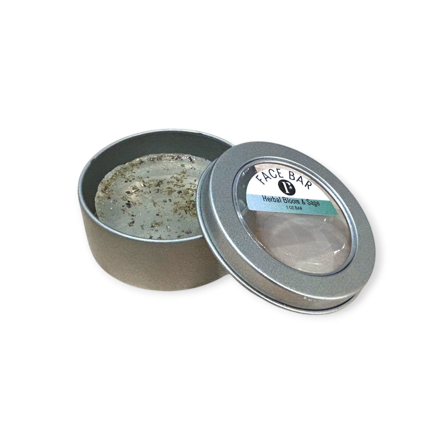 Refillism herbal bloom and sage face bar soap in a tin, natural personal care product with floral and herbal design.