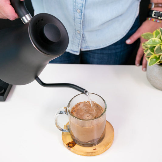 Fireside Coffee Co. French Vanilla Cafe Mocha in a mug, showcasing creamy vanilla and rich chocolate flavors.