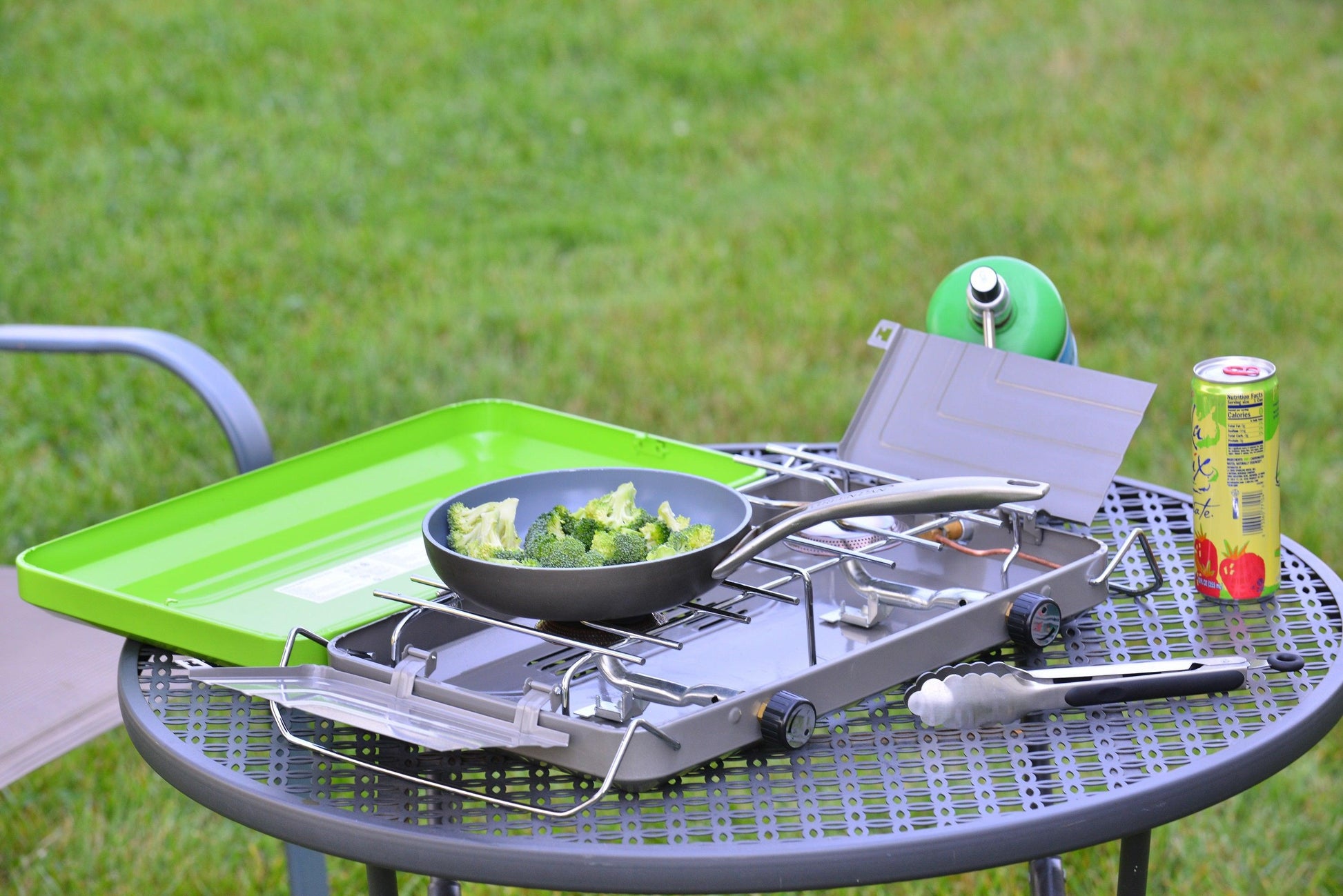 Flame King 2 Burner Portable Propane Gas Camping Stove Grill with metal burners and control knobs, ideal for outdoor camping cooking.