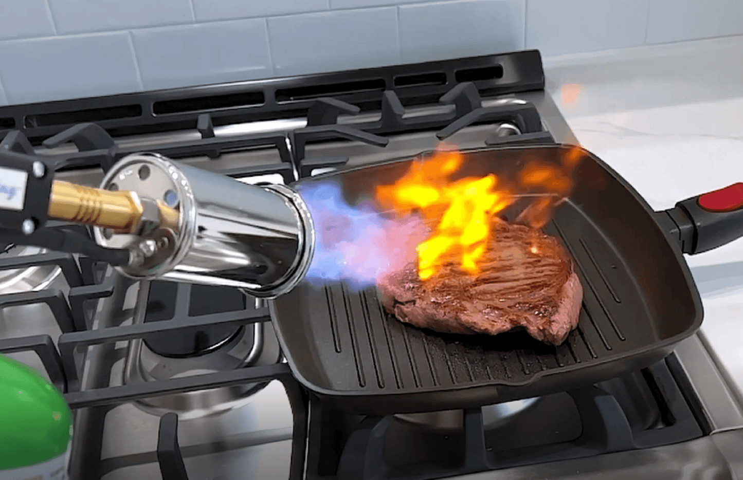 Flame King high-intensity propane searing torch with electric start and comfort handle, used for cooking and weed burning.