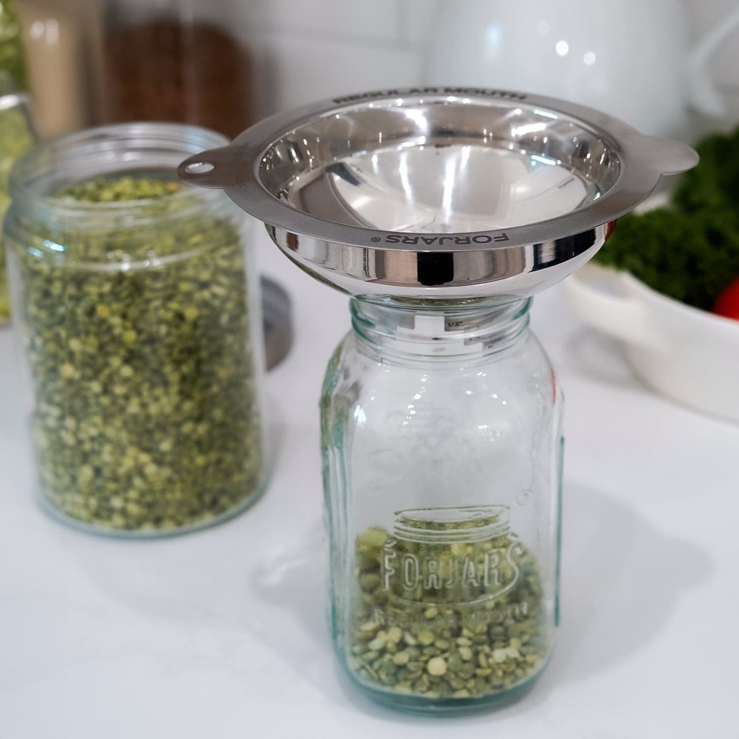 Forjars® funnel set with multiple sizes of stainless steel funnels for kitchen or crafting use.