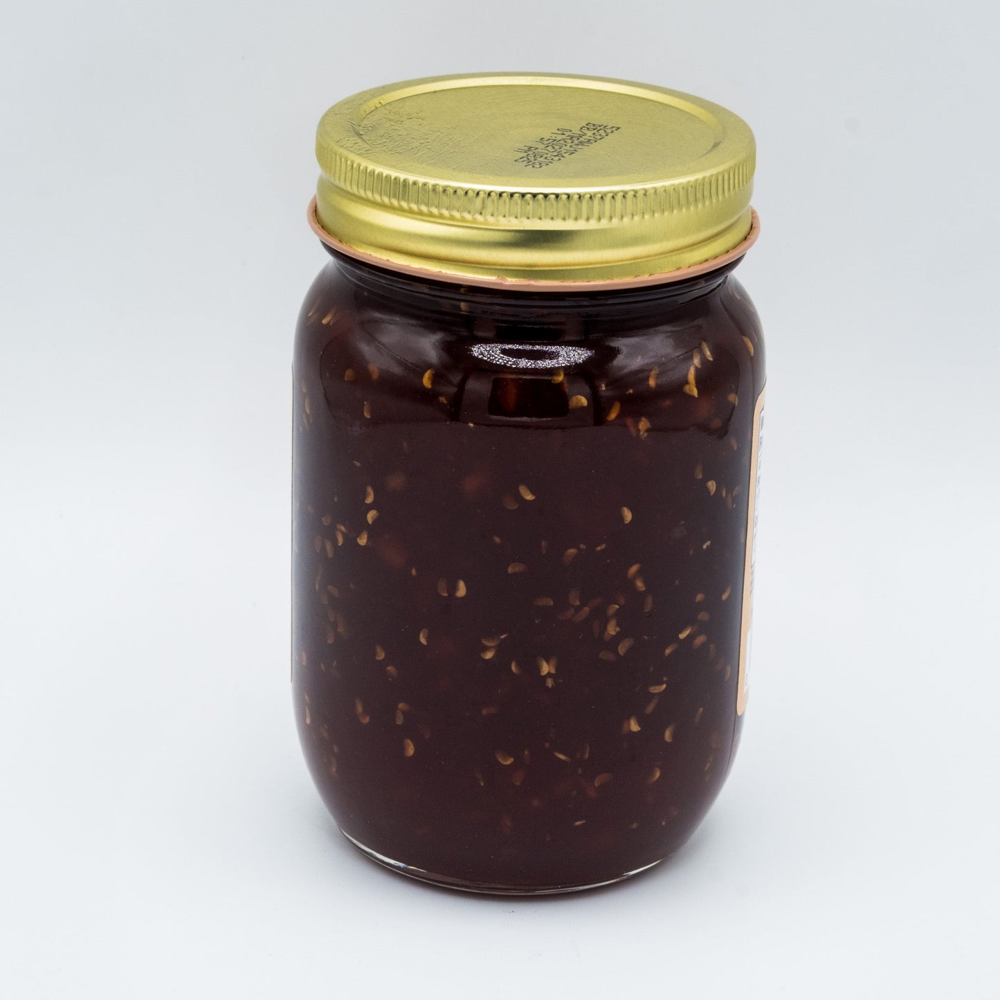 Canned Frog Jam in an 18 oz jar from Amish Country Store, featuring a frog illustration on the label.