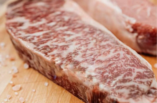 Fullblood Wagyu beef strip steak from Five Oaks Farm Wagyu in FOF The Five Oaks Griller's Box, showcasing marbled premium beef.