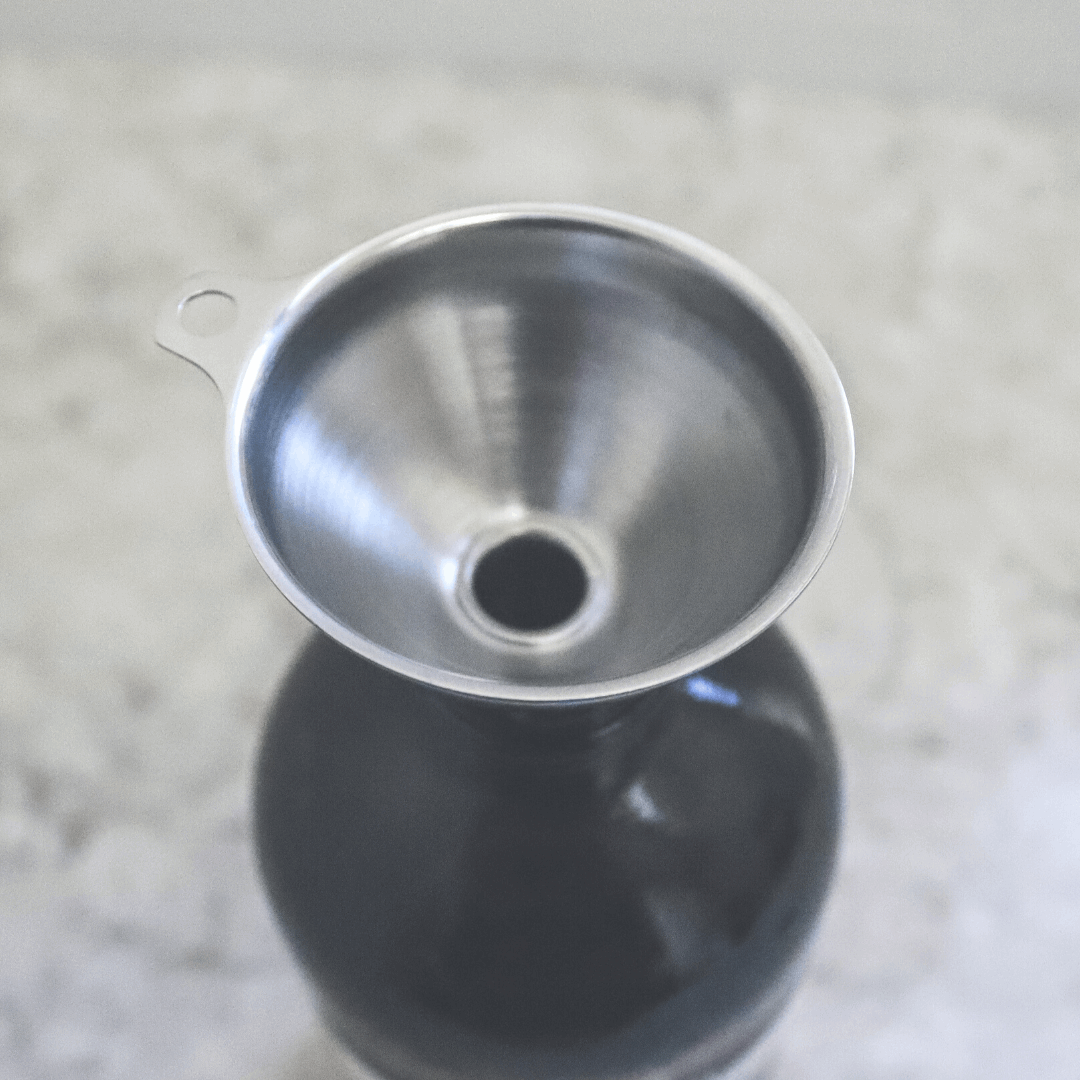 Refillism metal funnel set for home and cleaning tasks, featuring multiple sizes for versatile liquid pouring and transfer.