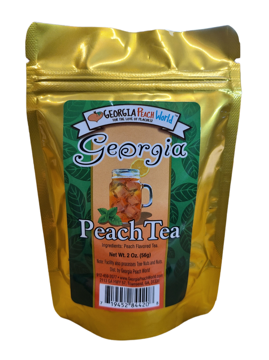 Loose leaf Georgia Peach Tea from Georgia Peach World, showcasing fresh peach-flavored tea leaves in a clear container.