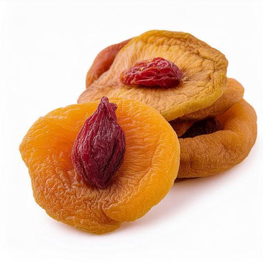 Dried peaches from Georgia Peach World, close-up view of vibrant, chewy dried peach slices on a white background.