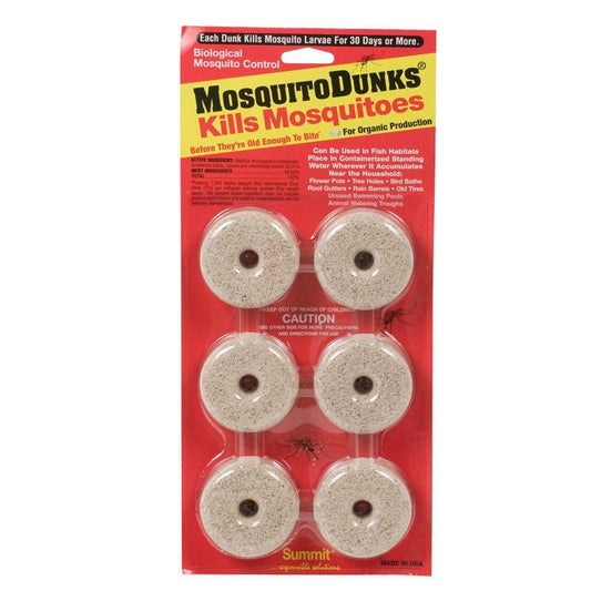 Pack of 6 Grow Organic Mosquito Bt Floating Donuts for pest control, biodegradable mosquito dunks in a natural outdoor setting.