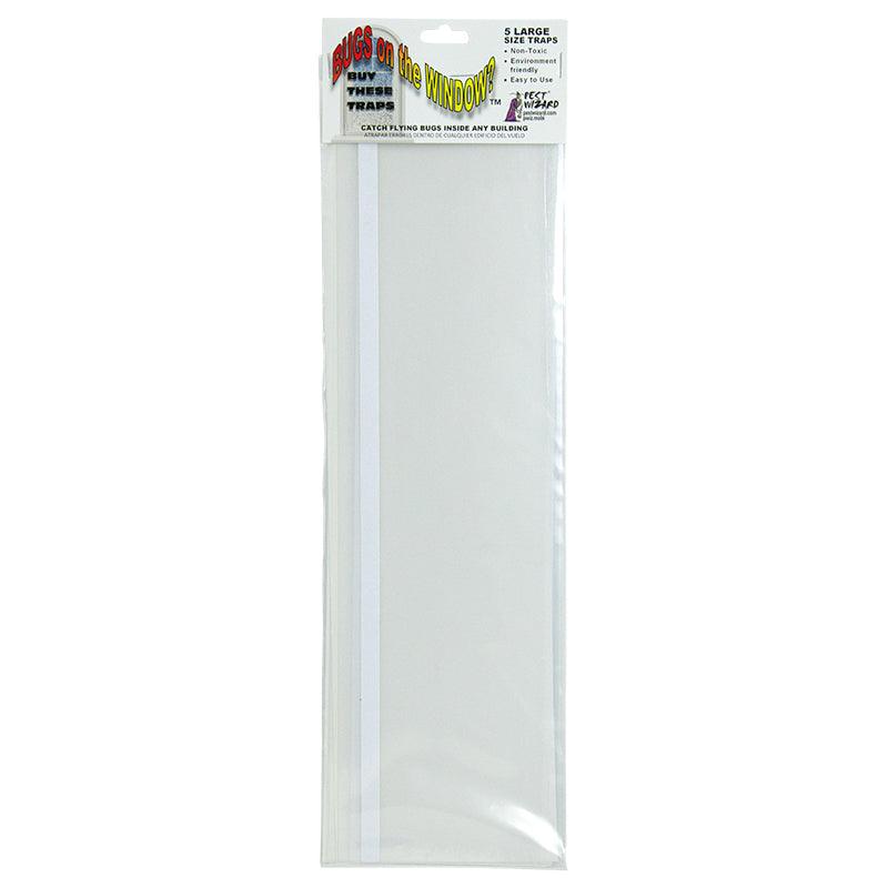 Grow Organic Pest Wizard bug control spray on a window, large 5-pack for effective pest management in homes or gardens.