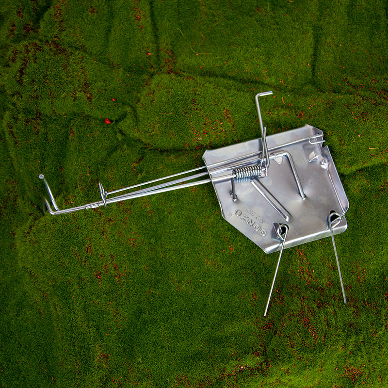 Grow Organic SureFire Gopher Trap for pest control, showing the durable metal trap ready for gopher capture.