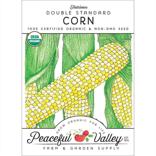 Organic Double Standard Corn Seeds from Grow Organic, showcasing fresh corn kernels and green husks in a vegetable seed packet.