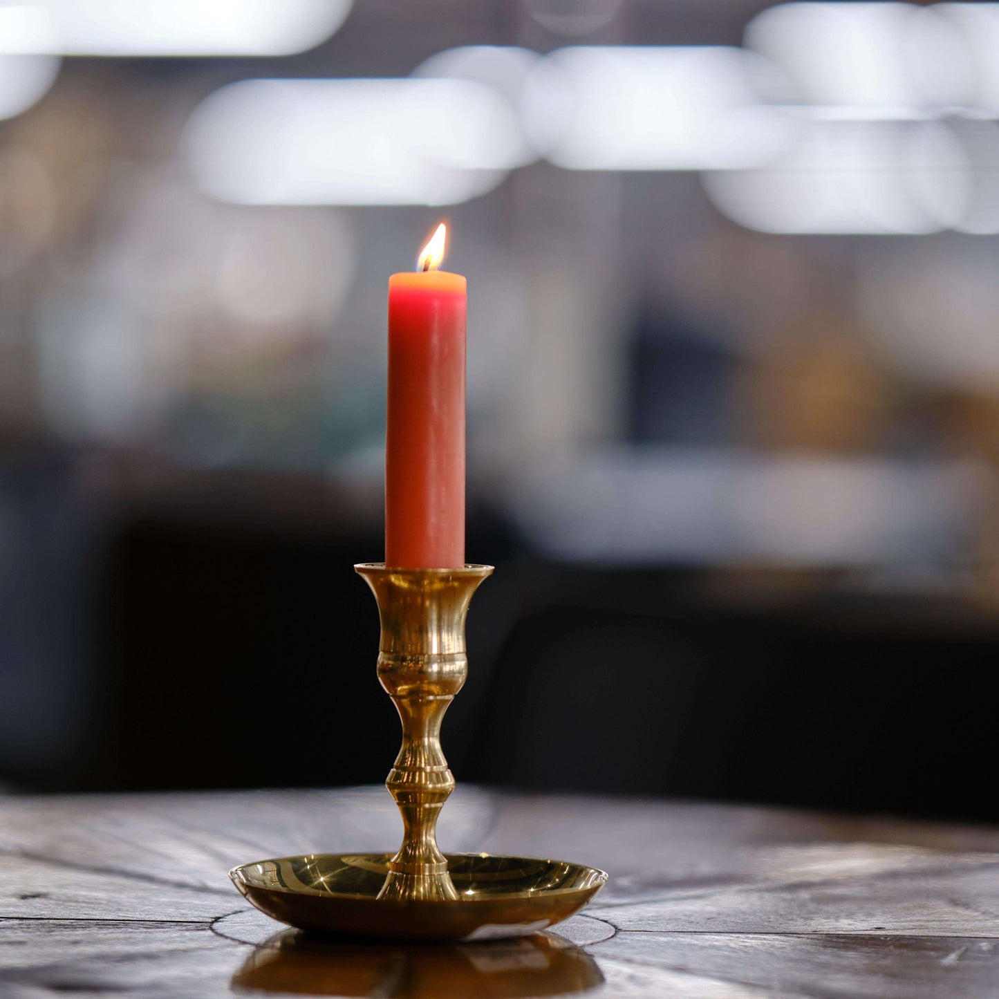 Hand-dipped beeswax taper candles in a bulk 4-pair bundle by Bluecorn Candles, showcasing natural beeswax texture and warm color.
