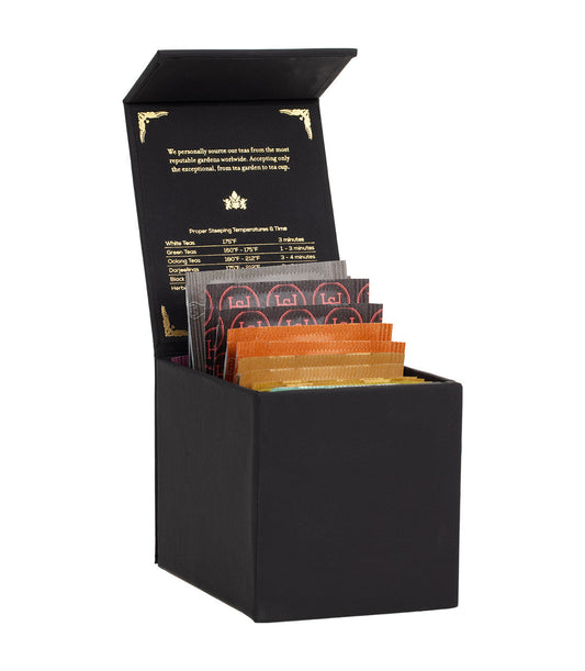Harney & Sons Heritage Herbal and Decaf Tea Bag Sampler in a black box, showcasing a variety of tea bags for tasting.