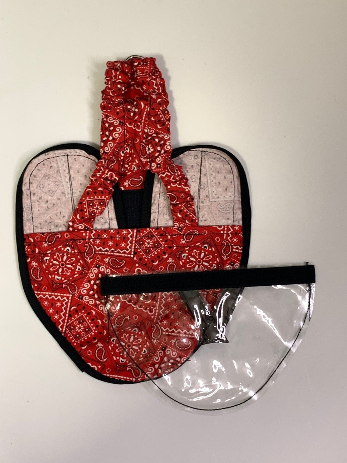 Pigeon, chicken, duck, and goose diaper with removable vinyl liner by Crazy K Farm Pet and Poultry, shown on a bird harness.