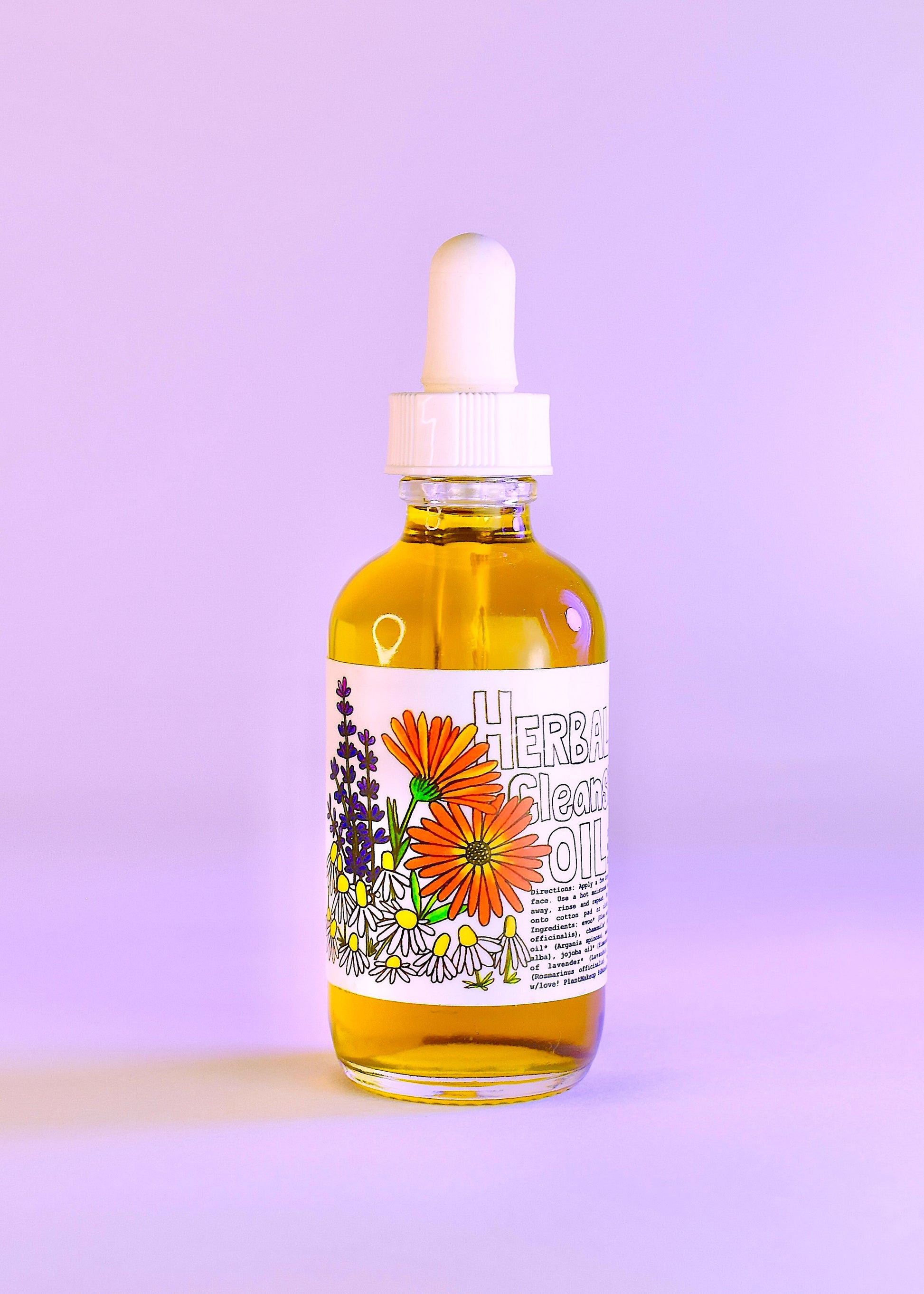 Plant Makeup Herbal Cleansing Oil in a clear bottle with a pump, showcasing its natural herbal ingredients and light consistency.