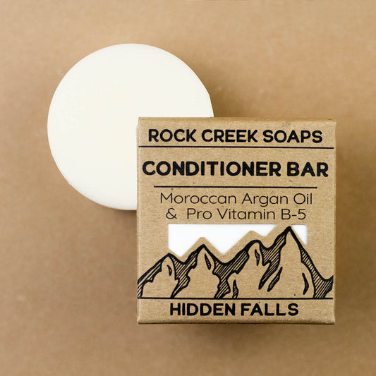Rock Creek Soaps Hidden Falls Conditioner Bar with argan oil, showcasing the natural, rectangular conditioner bar on a neutral background.