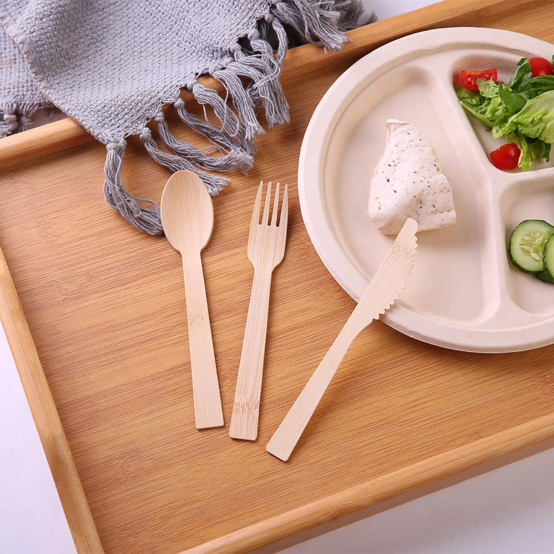 6.7-inch wrapped bamboo disposable cutlery set by Holy City Straw Company, includes fork, knife, and spoon in eco-friendly packaging.