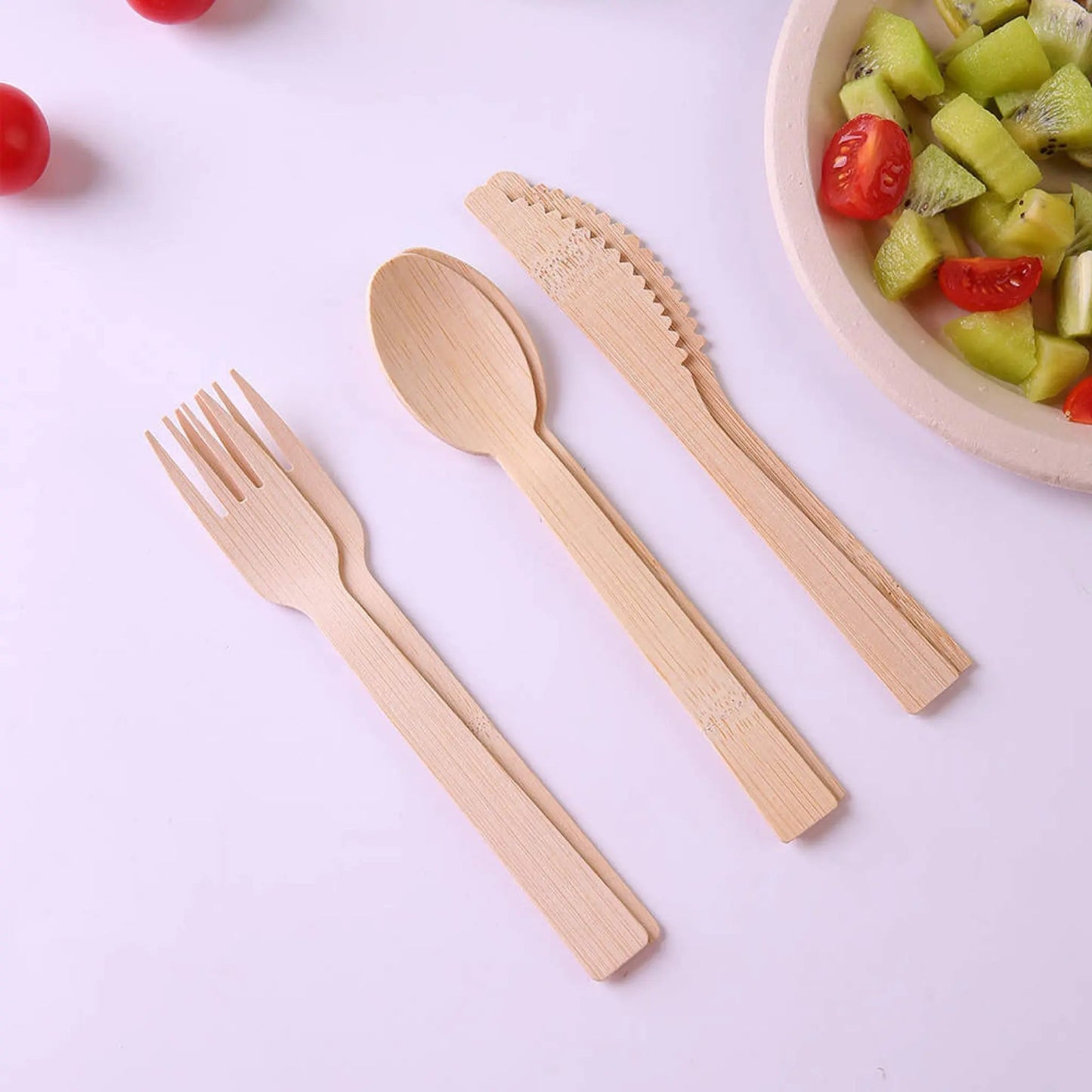6.7-inch wrapped bamboo disposable cutlery set from Holy City Straw Company, includes fork, knife, and spoon in eco-friendly packaging.
