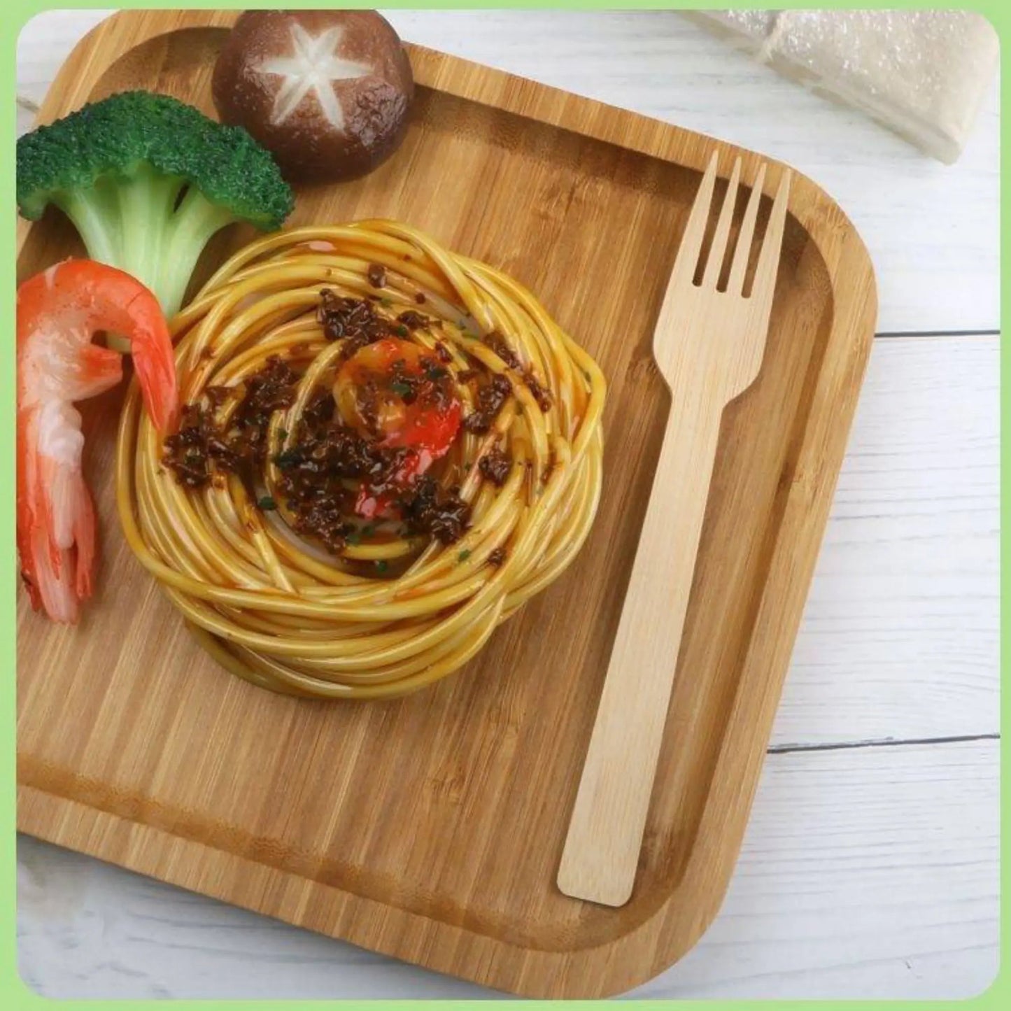 Six 6.7-inch bamboo forks from Holy City Straw Company, disposable cutlery with natural wood finish.