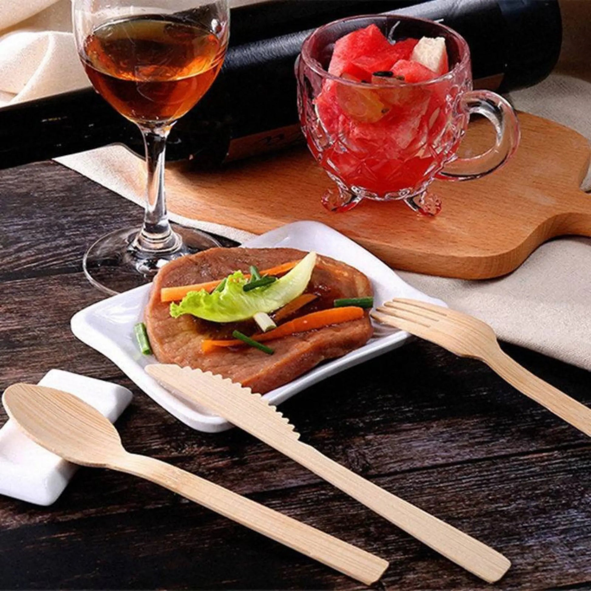 Six 6.7-inch bamboo knives from Holy City Straw Company disposable cutlery set, eco-friendly and natural-looking.