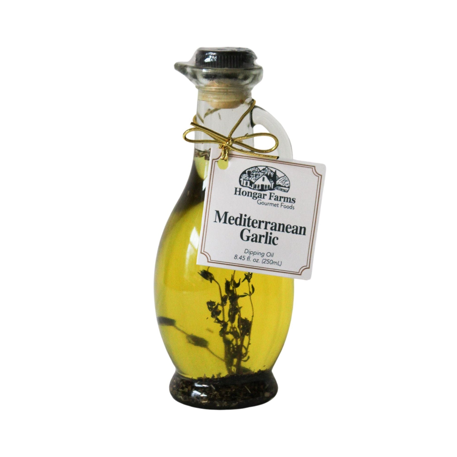Bottle of Hongar Farms Mediterranean garlic-infused extra virgin olive oil blend in a 250ml cruet, with fresh garlic and olive oil visible.