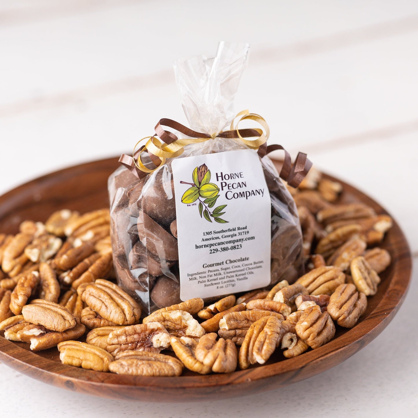 Small gift snack featuring assorted candies from Horne Pecan Company, displayed in a decorative box.